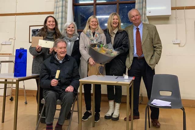 Richard Easom retires as a councillor on Grimston, Saxelbye and Shoby Parish Council - he is pictured (seated) with wife Jane and their daughters, plus council chair Tony Lomas EMN-221204-110855001