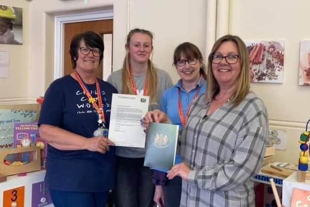 Oasis pre-School staff, including manager Victoria Conyers (right), show off the letter from the Lord-Lieutenant of Leicestershire thanking them on their work during the coronavirus pandemic EMN-210419-181058001