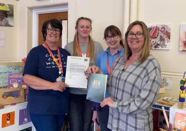 Oasis pre-School staff, including manager Victoria Conyers (right), show off the letter from the Lord-Lieutenant of Leicestershire thanking them on their work during the coronavirus pandemic EMN-210419-181058001