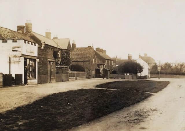 Wymondham Main Street in 1904 EMN-210422-132929001