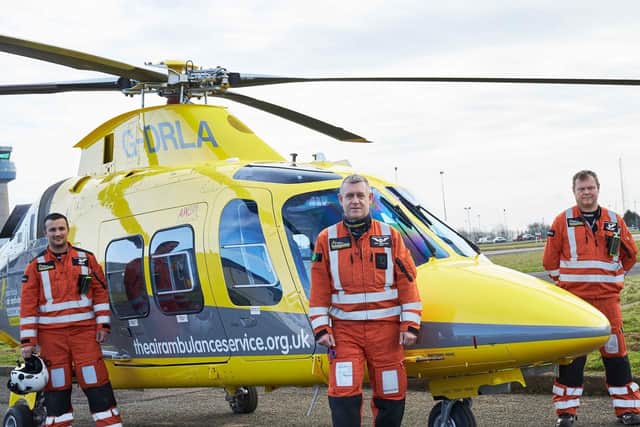 Crew members with the Derbyshire, Leicestershire& Rutland Air Ambulance (DLRAA) - an emergency landing needed to be made this week after a bird strike EMN-210423-114426001