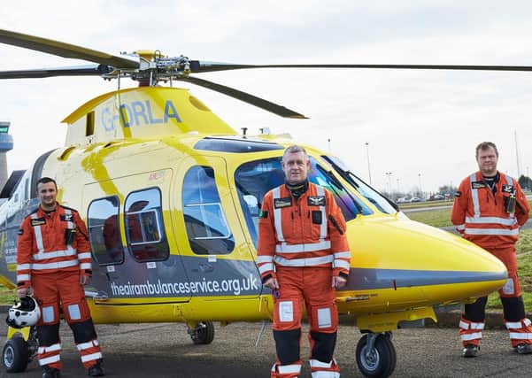 Crew members with the Derbyshire, Leicestershire& Rutland Air Ambulance (DLRAA) - an emergency landing needed to be made this week after a bird strike EMN-210423-114426001