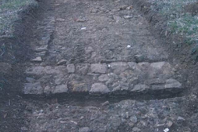 A pit revealing evidence of Roman occupation near Scalford EMN-210505-144914001