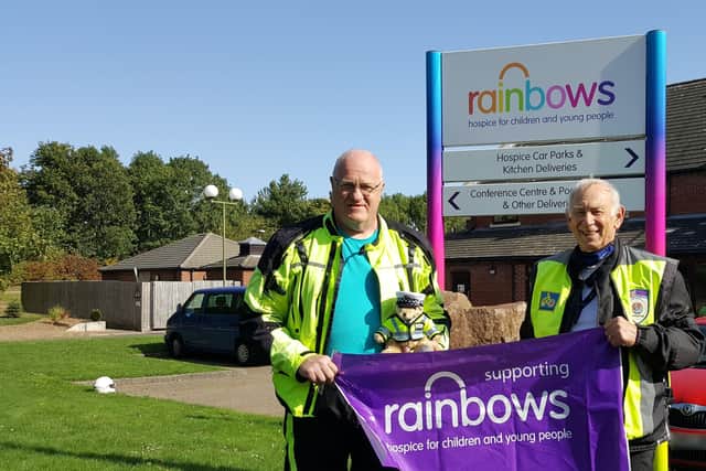 Roy Edwards (right) with fellow International Police Association member, Brian Collins, and Juno the Teddy bear who accompanies them on their tours across the UK and overseas in aid of Rainbows Hospice EMN-210430-135550001