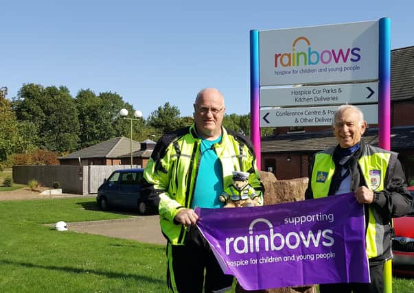 Roy Edwards (right) with fellow International Police Association member, Brian Collins, and Juno the Teddy bear who accompanies them on their tours across the UK and overseas in aid of Rainbows Hospice EMN-210430-135550001