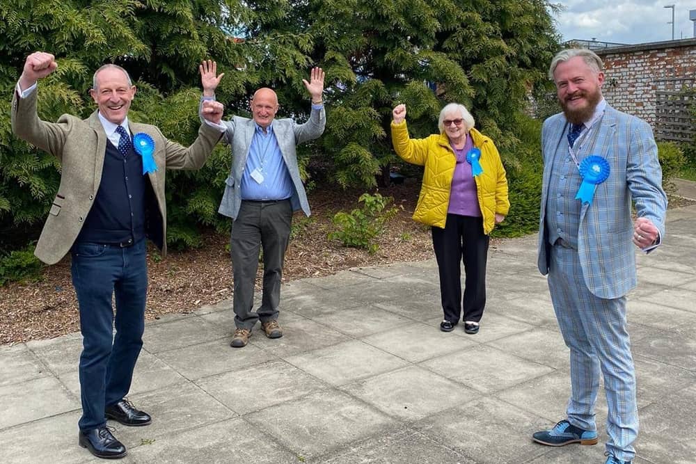 The elected members of Leicestershire County Council in the four Melton area divisions celebrate their success this afternoon, from left, Bryan Lovegrove, Joe Orson, Pam Posnett and Mark Frisby EMN-210705-141305001