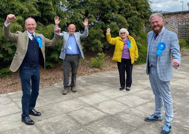 The elected members of Leicestershire County Council in the four Melton area divisions celebrate their success this afternoon, from left, Bryan Lovegrove, Joe Orson, Pam Posnett and Mark Frisby EMN-210705-141305001