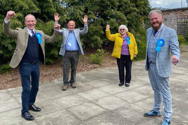 The elected members of Leicestershire County Council in the four Melton area divisions celebrate their success this afternoon, from left, Bryan Lovegrove, Joe Orson, Pam Posnett and Mark Frisby EMN-210705-141305001
