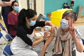 Latham House GP Dr Fahreen Dhanji gives a coronavirus jab to a patient at the vaccination centre at Melton Sports Village EMN-210705-172501001