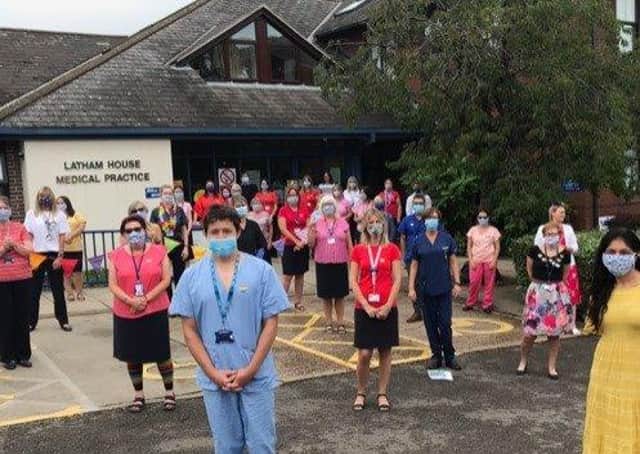 Staff at Latham House Medical Practice pictured last summer in the first months of the coronavirus pandemic EMN-210514-141121001