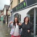 Jolli Waterland (left) outside her new Melton restaurant, Kristie's, with sister Dominique Carnall, mother of the late Kristie Bishop, whose memory inspired the eaterie EMN-210517-174629001