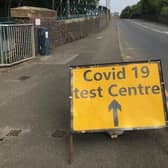 A sign on Burton Road bridge flagging up a Covid-19 test site in Melton EMN-210518-101740001