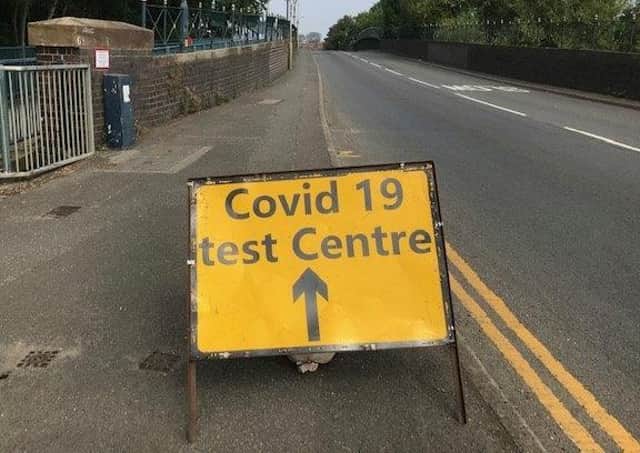 A sign on Burton Road bridge flagging up a Covid-19 test site in Melton EMN-210518-101740001