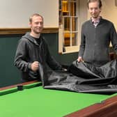 Covers off: Owner Ben Jackson (right) and staff member Karl Barratt preparing to reopen Jackson’s Lounge after lockdown restrictions were eased this week