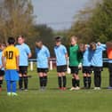 Asfordby's U10 Cobras team and their opponents were among sides to observe a sombre minute's silence on Sunday in memory of first team player Callum Payne, 21, and and young football fan Jordan Banks, who both tragically lost their lives last week. Photo: Phil James