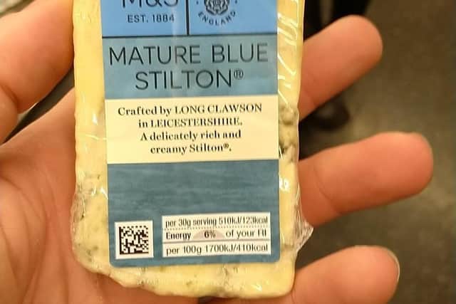 The photo drug dealer Carl Stewart shared of himself holding a block of Stilton made at Long Clawson Dairy which enabled police to analyse his fingerprints
PHOTO MERSEYSIDE POLICE EMN-210525-124552001