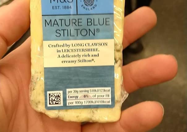 The photo drug dealer Carl Stewart shared of himself holding a block of Stilton made at Long Clawson Dairy which enabled police to analyse his fingerprints
PHOTO MERSEYSIDE POLICE EMN-210525-124552001