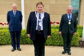 New Mayor of Melton, Councillor Peter Faulkner, flanked by outgoing Mayor, Councillor Malise Graham (left) and newly-elected Deputy Mayor, Councillor Alan Hewson EMN-210526-125500001