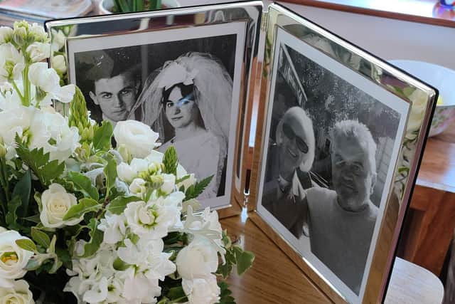 A photo frame gift for Reg and Julia Brogden at their diamond wedding celebrations at Waltham Hall Nursing Home EMN-210406-125037001