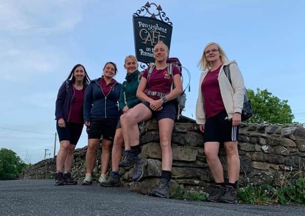 From left, Hayley Inchley, Claire Fleming, Liz Riley, Michelle Kent and  Jo Wright, pictured taking a break during their Three Peaks Challenge in aid of Great Dalby Pre-School EMN-210615-114504001