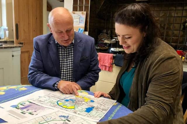 Melton Borough Council leader Joe Orson examines the route of the approved Melton Mowbray Distributor Road (MMDR) with Rutland and Melton MP, Alicia Kearns EMN-210615-130140001