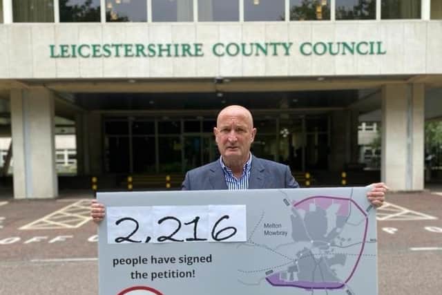 Melton Borough Council leader, Councillor Joe Orson, delivers a petition to County Hall calling on Leicestershire County Council to reconsider its intention to reject £15milllion in government funding towards a proposed southern link to Melton's approve partial bypass EMN-210621-124759001