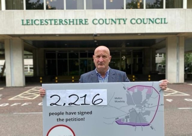 Melton Borough Council leader, Councillor Joe Orson, delivers a petition to County Hall calling on Leicestershire County Council to reconsider its intention to reject £15milllion in government funding towards a proposed southern link to Melton's approve partial bypass EMN-210621-124759001