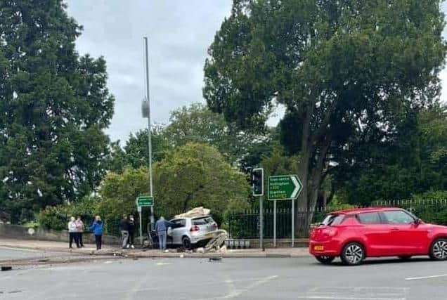 The aftermath of a road collision which caused an historic archway at Melton's Memorial Gardens to be demolished EMN-210621-134040001