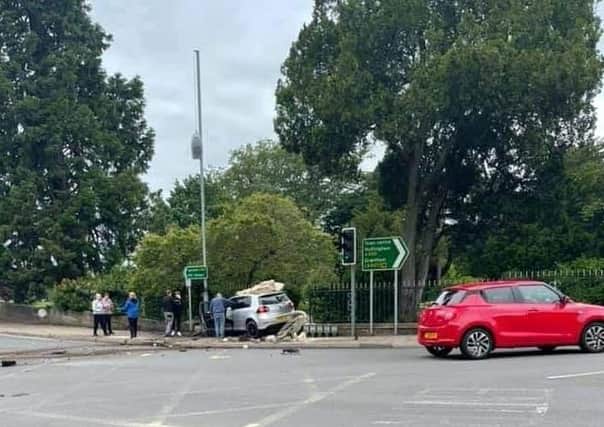 The aftermath of a road collision which caused an historic archway at Melton's Memorial Gardens to be demolished EMN-210621-134040001
