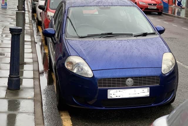 Cars parked on yellow lines in Sherrard Street, Melton, on Friday evening EMN-210621-152959001