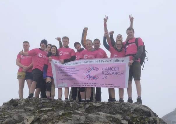 Family members and employees at Wrights Agriculture, a family farming business based in Saxelbye, celebrate taking on the 3 Peaks Challenge for charity EMN-210629-083351001
