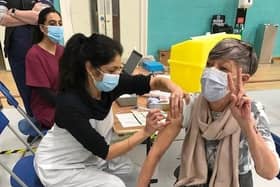 Latham House GP Dr Fahreen Dhanji gives a coronavirus jab to a patient at the vaccination centre at Melton Sports Village EMN-210624-160621001