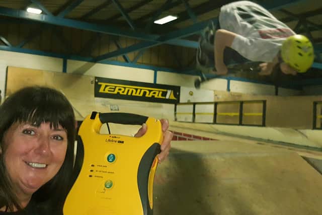 Director Kerry Lomas pictured with a new defibrillator at Terminal 1 skatepark in Melton back in 2017 EMN-210107-120617001