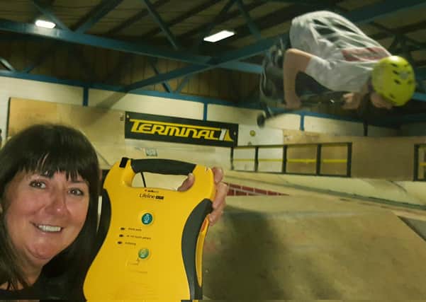 Director Kerry Lomas pictured with a new defibrillator at Terminal 1 skatepark in Melton back in 2017 EMN-210107-120617001