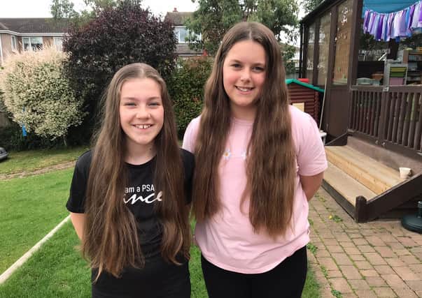 Melton school friends Millie and Lucie who are having their long hair cut in aid of the Little Princess Trust EMN-210107-181454001