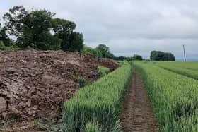 A pile of sludgecake (treated human waste) stored near the village of Saxby, which some residents are very unhappy about EMN-210107-104050001