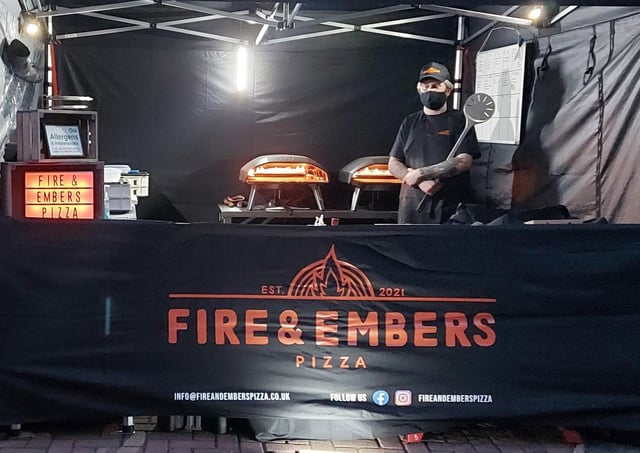 Louis Morgan making pizzas for the Fire and Embers pizza business at Melton Livestock Market EMN-210607-084237001
