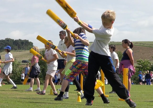 Youngsters enjoy a session run by the Belvoir Cricket and Countryside Trust at Knipton - the scheme is being run again in August EMN-210807-172614001