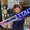 The special Euro 2020 scarf being sold at Melton shop, How Sweet, ahead of Sunday's England v Italy final EMN-210907-145353001