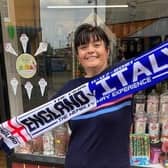 The special Euro 2020 scarf being sold at Melton shop, How Sweet, ahead of Sunday's England v Italy final EMN-210907-145353001