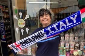 The special Euro 2020 scarf being sold at Melton shop, How Sweet, ahead of Sunday's England v Italy final EMN-210907-145353001