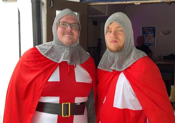 Kyle Hendy and Jake Shelley dressed as St George at Melton's Half Moon pub for the England v Italy Euro 2020 final EMN-211207-095917001