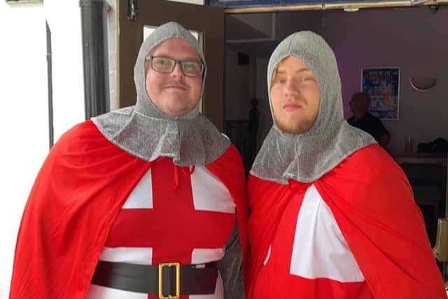 Kyle Hendy and Jake Shelley dressed as St George at Melton's Half Moon pub for the England v Italy Euro 2020 final EMN-211207-095917001