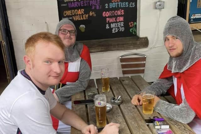 Kyle Hendy and Jake Shelley dressed as St George at Melton's Half Moon pub for the England v Italy Euro 2020 final EMN-211207-095927001