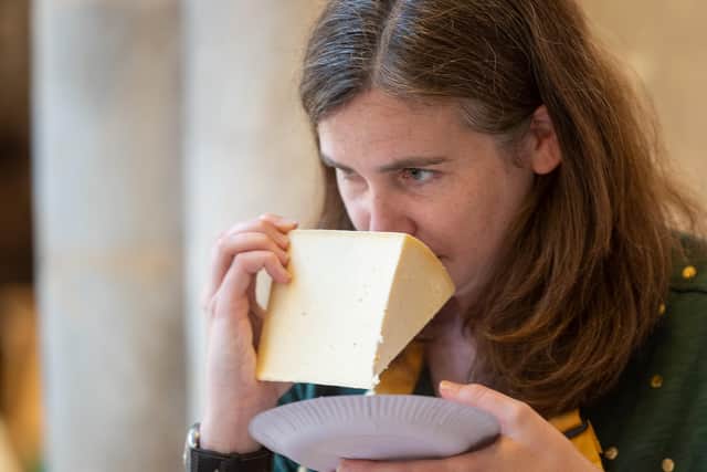 A judge takes a smell of one of the hundreds of cheeses entered for the Artisan Cheese Awards at Melton this year
PHOTO Martin Elliott EMN-210719-130839001