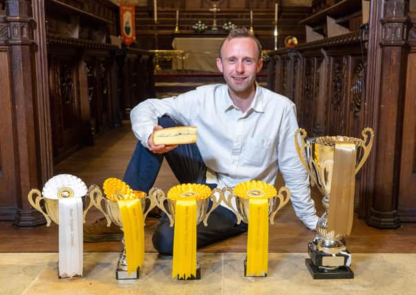David Jowett, winner of the Supreme Champion trophy and a number of other awards at the Artisan Cheese Awards at St Mary's Church, Melton this year
PHOTO Martin Elliott EMN-210719-130751001