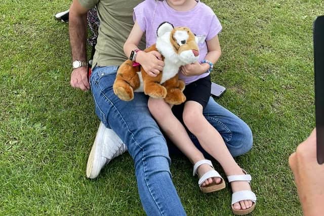 Florentina Burton with parents Kevin and Amelia EMN-210726-130816001