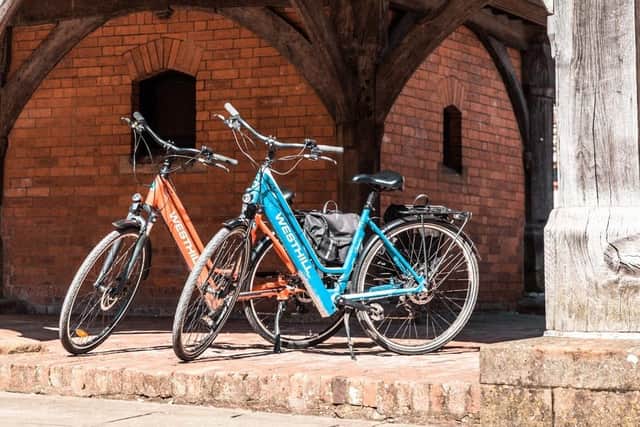 Electric bikes - the county council is offering £300 vouchers to residents off the cost of one EMN-210730-115734001