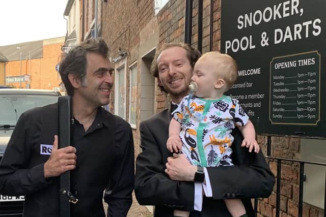 Ronnie O'Sullivan with owner Ben Jackson and his son Louie before the exhibition night at Jackson's in Melton EMN-210908-092036001