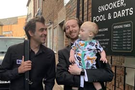 Ronnie O'Sullivan with owner Ben Jackson and his son Louie before the exhibition night at Jackson's in Melton EMN-210908-092036001